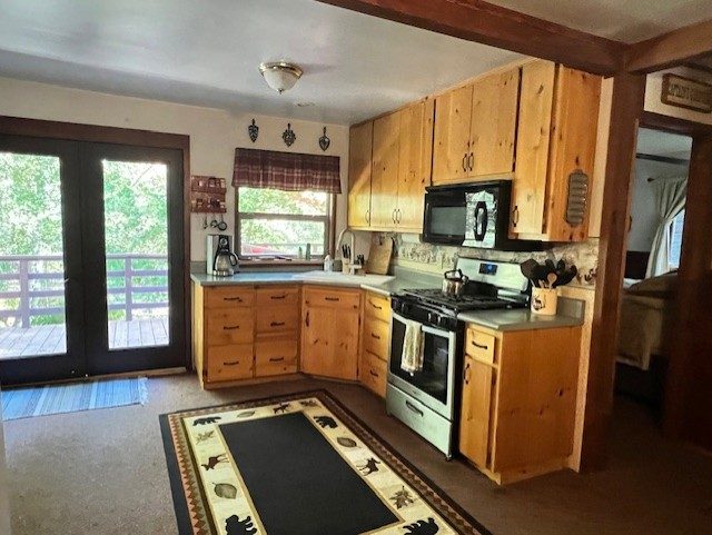 Kitchen with deck doors
